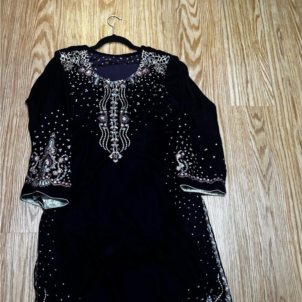 Embellished Black Dress with Intricate Details